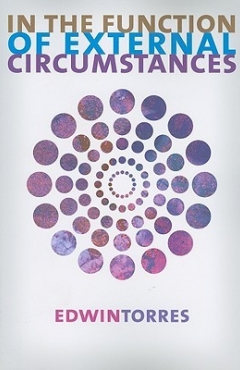 Concentric purple dots form the main image of the cover.