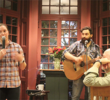 The band Leland Sundries performs a song for an animated audience