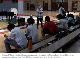 NYT photo of Brooke O'Harra directing students.