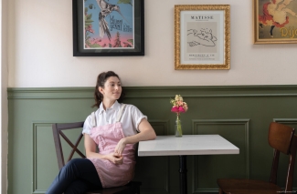 Photograph of chef Amanda Schulman inside her restaurant