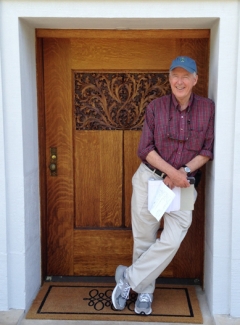 Photograph of Paul Hendrickson leaning in a doorway