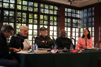 A photograph from the live recording of the 200th episode of "Poem Talk." Host Al Filreis converses with poets William J. (Billy Joe) Harris, Aldon Lynn Nielsen, Tyrone Williams, and Evie Shockley at the Kelly Writers House.